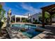 Stunning pool area with covered patio and statue, perfect for relaxation and outdoor entertaining at 6620 E Stallion Rd, Paradise Valley, AZ 85253