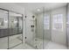 Modern bathroom with a walk-in shower and double sinks at 1264 E Walnut Rd, Gilbert, AZ 85298