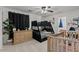 Spacious bedroom with bunkbeds, a crib and dresser providing ample space for a growing Gathering at 1264 E Walnut Rd, Gilbert, AZ 85298
