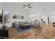 Spacious living room with an open layout, wood floors, and plenty of natural light at 1264 E Walnut Rd, Gilbert, AZ 85298