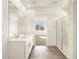 Bathroom features a double vanity, tiled floors, and a glass-enclosed shower at 3409 E Alexander Dr, San Tan Valley, AZ 85143