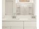 A large bathroom with dual sinks and quartz countertops at 3409 E Alexander Dr, San Tan Valley, AZ 85143