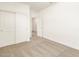 An empty bedroom is shown with carpet and sliding closet doors at 3409 E Alexander Dr, San Tan Valley, AZ 85143