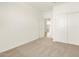 Cozy bedroom featuring neutral carpet, white walls, and a closet at 3409 E Alexander Dr, San Tan Valley, AZ 85143
