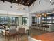 Spacious community center lounge area with comfortable seating, a stylish bar, and scenic views at 3409 E Alexander Dr, San Tan Valley, AZ 85143