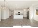 Bright kitchen boasts a central island with stainless steel appliances and a modern design at 3409 E Alexander Dr, San Tan Valley, AZ 85143