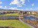 Aerial view of community amenities including a basketball court and pickleball courts at 4667 N 177Th Dr, Goodyear, AZ 85395