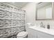 Clean bathroom with a shower/tub combo and vanity at 3646 N 69Th Ave # 60, Phoenix, AZ 85033
