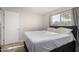 Bright bedroom with a double bed and ample closet space at 3646 N 69Th Ave # 60, Phoenix, AZ 85033