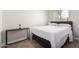 Well-lit bedroom featuring a double bed and a side table at 3646 N 69Th Ave # 60, Phoenix, AZ 85033