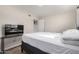 Bedroom with a double bed, TV, and additional storage at 3646 N 69Th Ave # 60, Phoenix, AZ 85033