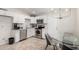 Modern kitchen with stainless steel appliances and white cabinets at 3646 N 69Th Ave # 60, Phoenix, AZ 85033