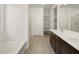 Bright bathroom featuring dual sinks, modern fixtures, and ample counter space at 3668 E Alexander Dr, San Tan Valley, AZ 85143