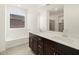 Bathroom with double vanity, soaking tub, and shower at 36853 W La Paz St, Maricopa, AZ 85138