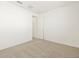 Bright bedroom with neutral walls and carpeting at 36853 W La Paz St, Maricopa, AZ 85138