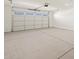 Attached garage with epoxy flooring at 36853 W La Paz St, Maricopa, AZ 85138