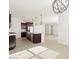 Modern kitchen with stainless steel appliances and an island at 36853 W La Paz St, Maricopa, AZ 85138