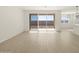 Open living space with sliding doors to patio at 36853 W La Paz St, Maricopa, AZ 85138