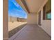 Covered patio offers a great view of the low-maintenance backyard at 18156 W Cielo Grande Ave, Surprise, AZ 85387