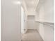 Spacious walk-in closet with rod and shelf storage for optimal organization at 18156 W Cielo Grande Ave, Surprise, AZ 85387