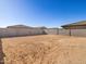 Large, flat backyard perfect for landscaping and recreation at 36887 W Prado St, Maricopa, AZ 85138