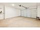 Spacious garage with automatic door opener at 36887 W Prado St, Maricopa, AZ 85138