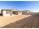 Spacious backyard with new home and block wall at 36893 W La Paz St, Maricopa, AZ 85138