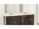 Bathroom with a double vanity and modern fixtures at 36893 W La Paz St, Maricopa, AZ 85138