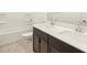 Bathroom with double vanity and soaking tub at 36893 W La Paz St, Maricopa, AZ 85138