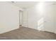 Bedroom with neutral carpeting and access to bathroom at 36893 W La Paz St, Maricopa, AZ 85138