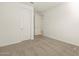 Simple bedroom with neutral walls and carpet at 36893 W La Paz St, Maricopa, AZ 85138