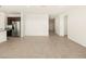Open concept kitchen with stainless steel appliances and granite countertops at 36893 W La Paz St, Maricopa, AZ 85138