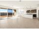 Modern kitchen with dark cabinets, granite counters and island at 36893 W La Paz St, Maricopa, AZ 85138