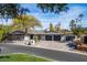 Luxury home with expansive driveway and beautifully landscaped grounds at 5919 N 45Th St, Phoenix, AZ 85018
