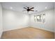 Spacious bedroom with large window and hardwood floors at 5919 N 45Th St, Phoenix, AZ 85018