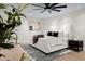 Spacious bedroom with a king-size bed and a view of the backyard at 5919 N 45Th St, Phoenix, AZ 85018