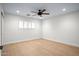 Light and airy bedroom with window and hardwood floors at 5919 N 45Th St, Phoenix, AZ 85018