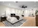 Bright bedroom with a plush bed, stylish decor, and hardwood floors at 5919 N 45Th St, Phoenix, AZ 85018