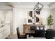 Elegant dining room with a wooden table, statement art, and ample natural light at 5919 N 45Th St, Phoenix, AZ 85018