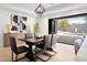 Modern dining area with large windows and a view of the backyard pool at 5919 N 45Th St, Phoenix, AZ 85018