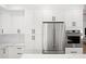 Modern kitchen with stainless steel appliances and white shaker cabinets at 5919 N 45Th St, Phoenix, AZ 85018