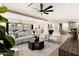 Open living room with hardwood floors, modern furniture, and access to backyard at 5919 N 45Th St, Phoenix, AZ 85018