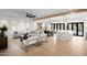 Spacious living area with hardwood floors, large windows, and an open concept design at 5919 N 45Th St, Phoenix, AZ 85018