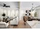 Elegant living and dining area with light hardwood floors and modern decor at 5919 N 45Th St, Phoenix, AZ 85018