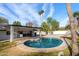 Relaxing kidney shaped pool with a large patio area at 5919 N 45Th St, Phoenix, AZ 85018