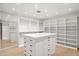 Large walk-in closet with ample shelving and drawers at 5919 N 45Th St, Phoenix, AZ 85018