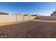 Large backyard with block wall and plenty of space for landscaping at 36894 W La Paz St, Maricopa, AZ 85138