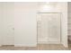 Clean bathroom with a large shower and shelving at 36894 W La Paz St, Maricopa, AZ 85138
