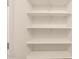 Empty pantry with ample shelving for storage at 36894 W La Paz St, Maricopa, AZ 85138