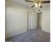 Cozy bedroom featuring plush carpeting, closet and ample space, offering a comfortable and versatile living space at 1446 S Revere --, Mesa, AZ 85210